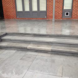 Grey Pavers in Backyard